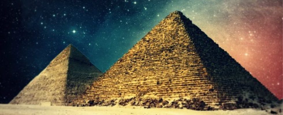 Pyramids infront of a star-filled sky